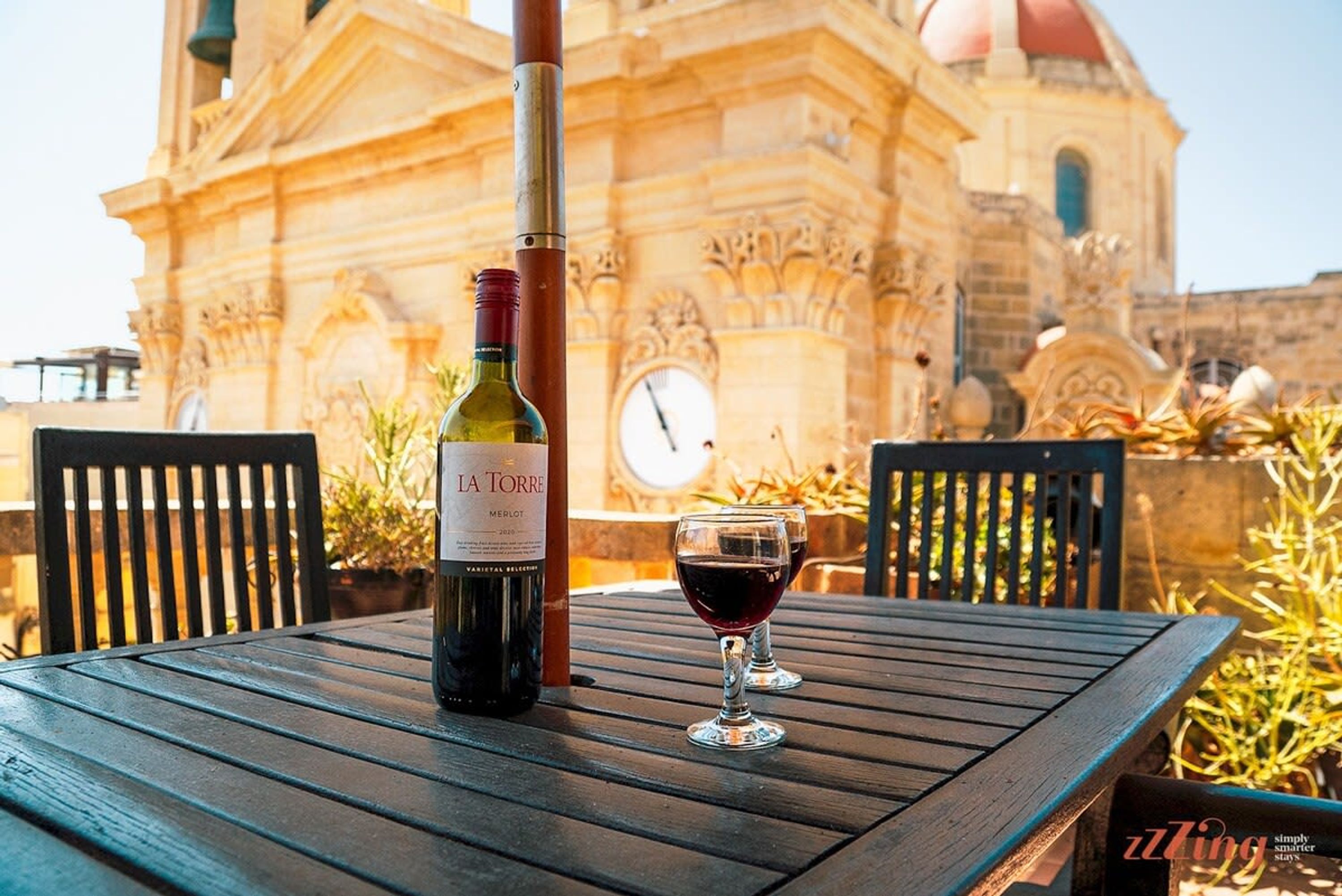 A pretty duplex apartment in a Gozo village square